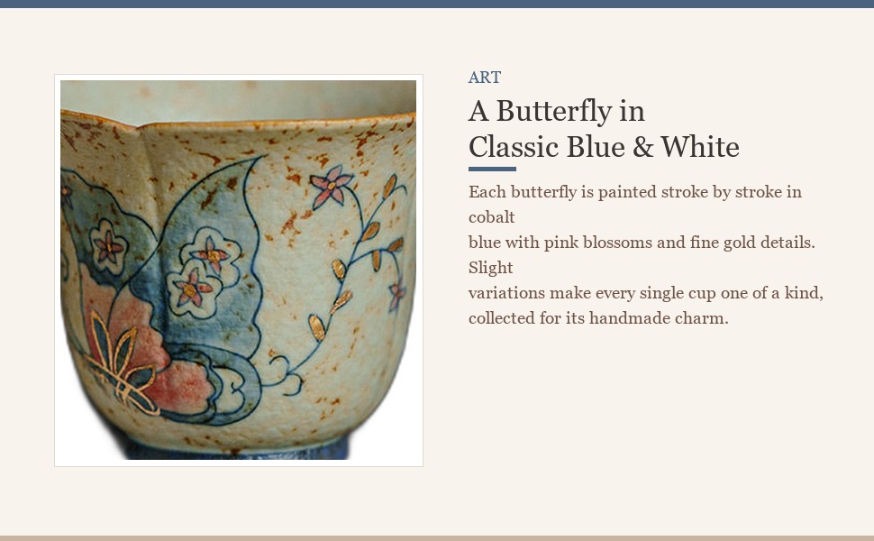 Hand-painted blue-white butterfly with gold tracing on flamestone red glaze